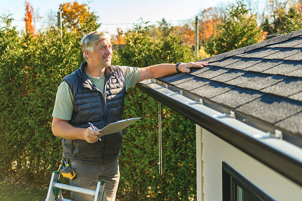 Professional Hail Damage Roof Repair technician working in Jansen, NE